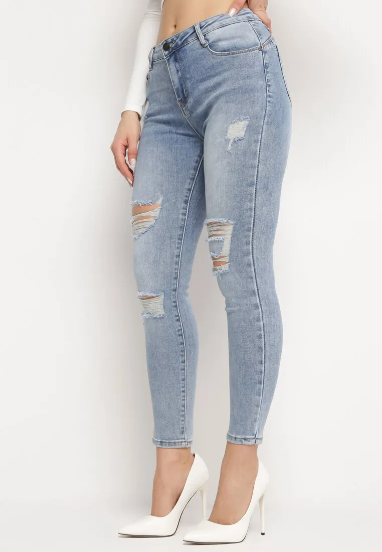 Jean skinny bleu avec trous et effet push up