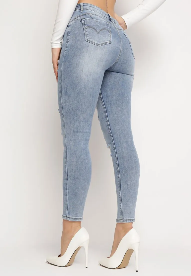 Jean skinny bleu avec trous et effet push up
