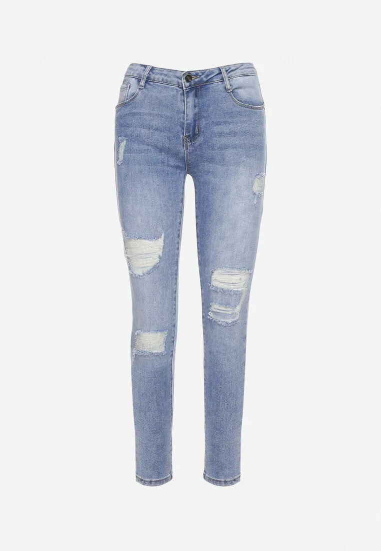 Jean skinny bleu avec trous et effet push up